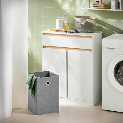 SoBuy BZR79-W Meuble de Salle de Bain avec Panier à Linge Intégré, Tiroir et Double Porte – Blanc et Bois